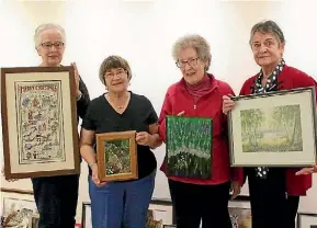  ?? TAMARA THORN/FAIRFAX NZ ?? Ann Bleakley, Ann Reeves, Pene Williamson and Alisa Gathergood show off embroidery displayed at the Taupo museum