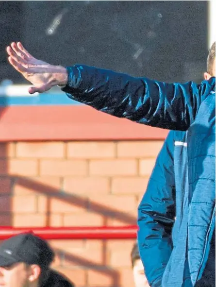  ?? Pictures: SNS. ?? Above: Dundee boss James McPake says not knowing when the Championsh­ip will return is frustratin­g. Far right: Kane Hemmings, right, celebrates with his team-mates after scoring against Ayr at Dens Park in March, the Dark Blues’ last match before the Covid-19 shutdown.