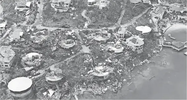  ?? CARIBBEAN BUZZ VIA AP ?? This photo provided by Caribbean Buzz shows the destructio­n left in the wake of Hurricane Irma on Friday, Sept. 8 in the U.S. Virgin Islands.