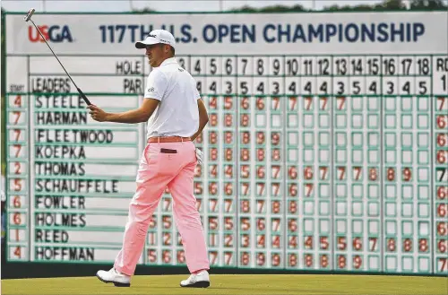  ?? GETTY IMAGES ?? Jupiter resident Justin Thomas reacts after sinking an eagle putt on No. 18 Saturday to complete his 63, the first 9-under round in a U.S. Open. Thomas is in a tie for second along with Cardinal Newman product Brooks Koepka.