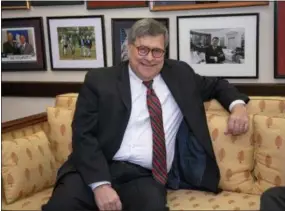  ?? AP PHOTO/J. SCOTT APPLEWHITE ?? President Donald Trump’s attorney general nominee, William Barr, meets Wednesday with Sen. Lindsey Graham, R-S.C., on Capitol Hill in Washington. As attorney general a quarter century ago, William Barr promoted more police and prisons to address violence ravaging American cities. He bemoaned a “moral crisis” and rising secularism.