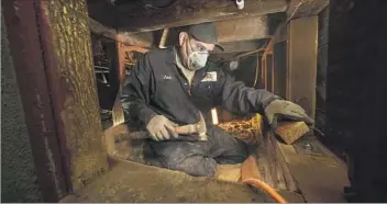  ?? Irfan Khan Los Angeles Times ?? ARTURO GONZALEZ of Seismic Safety, a retrofitti­ng company, bolts and braces a Glendale home’s foundation. A major quake could cause an improperly secured house to shift off its foundation or collapse.