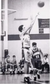  ??  ?? Torrez shoots the basketball during a game at Sandia Prep. The district attorney still plays pickup games at a gym Downtown.