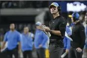  ?? DAVID BECKER — THE ASSOCIATED PRESS ?? Los Angeles Chargers head coach Brandon Staley stands on the sidelines during the first half against the Las Vegas Raiders on Thursday in Las Vegas.