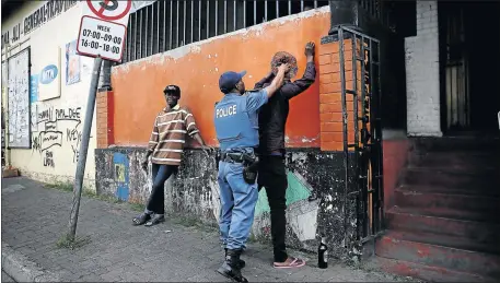  ?? PHOTO: ALON SKUY ?? After two weekends of violence in the rundown suburb of Rosettenvi­lle, the City of Joburg says it has launched an action plan to maintain safety in the area. This, according to the city, will include increased police visibility and stop-and-searches.