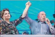  ?? Jefferson Benardes AFP/Getty Images ?? LULA and Dilma Rousseff, his impeached successor, attend a demonstrat­ion Tuesday in Porto Alegre.