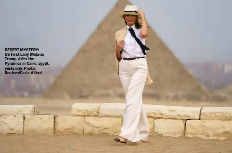  ??  ?? DESERT MYSTERY: US First Lady Melania Trump visits the Pyramids in Cairo, Egypt, yesterday. Photo: Reuters/Carlo Allegri