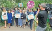  ?? AFP ?? ▪ Prime Minister Leo Varadkar (fourth from left) poses with activists from the "Yes" campaign.