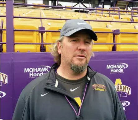  ?? THE ASSOCIATED PRESS ?? In this photo, Albany lacrosse coach Scott Marr talks to reporters in Albany, N.Y. Albany has led the nation in scoring four of the past five years and this year achieved a program first ‘A’ the top ranking in the nation.