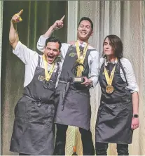  ??  ?? Chefs, from left, Serge Belair (silver medallist), JP Dublado (gold) and Doreen Prei (bronze) celebrate Canada’s Great Kitchen Party last fall.