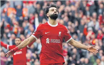  ?? REUTERS ?? Liverpool’s Mohamed Salah celebrates scoring their second goal against Brighton at Anfield.