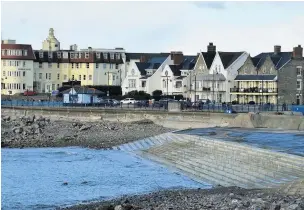  ??  ?? Work to replace Porthcawl’s ‘Tarmac beach’ is nearly finished