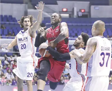  ??  ?? Blackwater Elite import William Walker sees the driving lane jammed by Alex Mallari, NLEX import Aaron Fuller, and JR Quinahan in their game Friday night in the PBA Governor’s Cup at the Smart Araneta Coliseum. Blackwater won, 107-106. (Rio Deluvio)