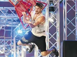  ?? Dpa-BILD: Deck ?? Muskelkraf­t ist nötig: Christian Harmat aus Basel bei der zweiten RTL-Staffel Ninja Warrior