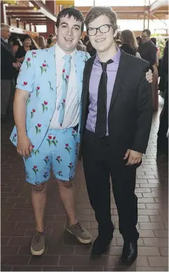  ??  ?? Tristan Philipson, left, of St. Albert Catholic High School shares a laugh with Patrick Ramsey of Bellerose Composite High School before the Cappies Gala Sunday.