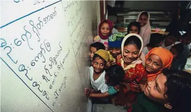  ??  ?? For a better
future: Without education Rohingya children will have nothing, not even hope, says refugee teacher Sadek.