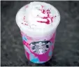  ?? THE ASSOCIATED PRESS FILES ?? Starbucks was distinctly NOT kidding with its Unicorn Frappuccin­o back in April.