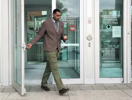  ?? TREVOR WILHELM ?? Tariq Elamin leaves the Ontario Court of Justice on Wednesday where he is on trial for several gun charges following an April 26, 2017, head-on collision on Highway 3.