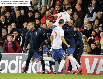  ??  ?? Aleksandar Mitrovic celebrates after scoring Serbia’s equaliser