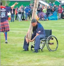  ??  ?? One disabled veteran tossed a caber from his wheelchair – twice – to great cheers.