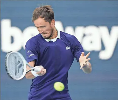  ?? LEE/AP ?? Daniil Medvedev returns a shot from Jenson Brooksby during the Miami Open on Tuesday in Miami Gardens, Fla. Medvedev won 7-5, 6-1.WILFREDO