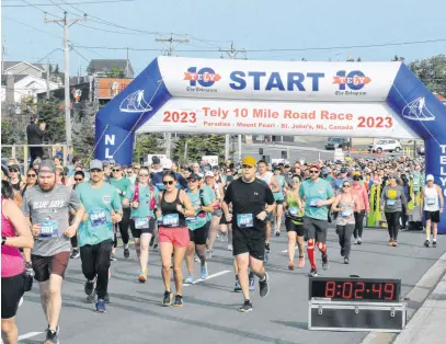  ?? • THE TELEGRAM ?? Runners and walkers leave the start line in Paradise during the 95th Tely 10 on June 25, 2023. JOE GIBBONS