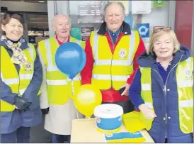  ?? ?? Mitchelsto­wn Lions Club members outside SuperValu, Mitchelsto­wn last Saturday during their street bucket collection, towards helping the people of Ukraine l-r: Therese Horgan, Jim Flynn, Tom Hyland and Mary Griffin.