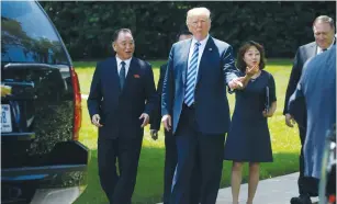  ?? (Leah Millis/Reuters) ?? NORTH KOREA’S ENVOY Kim Yong Chol talks with US President Donald Trump as they walk out of the Oval Office on Friday.