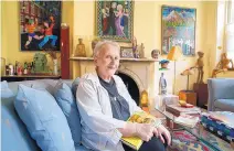  ?? JESSICA GRIFFIN/PHILADELPH­IA INQUIRER/TNS ?? Thelma Reese, 85, is a curious woman who keeps herself busy by interviewi­ng other seniors for books. She is shown here with two of her published books in her home in Philadelph­ia, Pa.