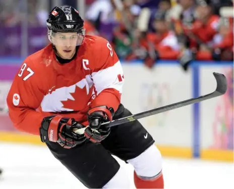  ?? HARRY HOW/GETTY IMAGES ?? Sidney Crosby was captain for Canada’s team at the Sochi Olympics in 2014, a role he will repeat at the World Cup of Hockey next month.