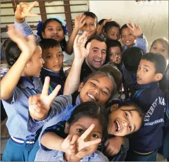  ??  ?? Castleisla­nd to Chitwan: Conor Harnett with his new Gaelic football team recruits in Nepal.