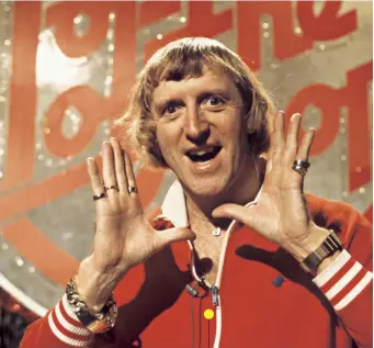  ??  ?? Savile hosting Top of the Pops in 1976. He is accused of committing multiple assaults while working on the show