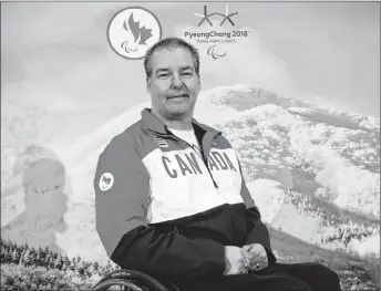  ?? THE CANADIAN PRESS/FRED CHARTRAND ?? Former para ice hockey player Todd Nicholson smiles after it was announced that he is to be Canada’s Chef de Mission for the PyeongChan­g 2018 Paralympic Winter Olympic games at a news conference in Ottawa recently Nicholson built his first hockey sled...