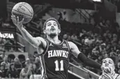  ?? Darren Abate / Associated Press ?? Hawks guard Trae Young finished with 31 points as Atlanta won its sixth straight game on Wednesday.