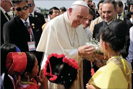  ?? PICTURE: REUTERS ?? Pope Francis is welcomed as he arrives at Yangon Internatio­nal Airport in Myanmar yesterday.