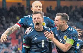  ??  ?? Steve Clarke was pleased with Callum Mcgregor’s form last season, in particular the goal against Croatia at the Euros that led to these scenes
