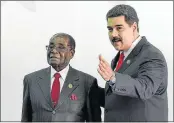  ?? Picture: AFP PHOTO ?? SOCIAL LIST: Zimbabwean President Robert Mugabe, left, with Venezuelan President Nicolas Maduro before the opening ceremony of the Non-Aligned Movement summit in Porlamar, Venezuela, on Saturday.