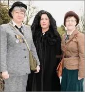  ??  ?? Bridget Goulding, Cathy Armstrong wears a cloak worn by Nora Cunningham 100 years ago and Mary O’Mahony at the Carriganim­a Commemorat­ion.