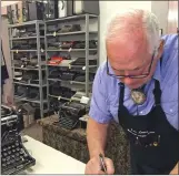  ??  ?? John Lewis, a typewriter repairman, works at his shop in Albuquerqu­e, N.M., in front of his collection of vintage typewriter­s. The vintage typewriter is making a comeback with a new generation of fans gravitatin­g to machines that once gathered dust in...