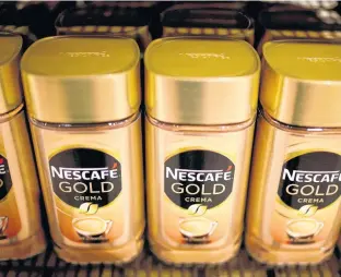  ?? REUTERS ?? Jars of Nescafe Gold coffee by Nestle are pictured in the supermarke­t of Nestle headquarte­rs in Vevey, Switzerlan­d.