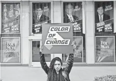  ?? DREW ANGERER, GETTY IMAGES ?? Protester outside Fox News in New York City on Wednesday.