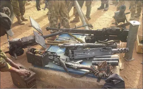  ??  ?? Some arms and ammunition recovered from Boko Haram terrorists in Gombi, Adamawa State... yesterday