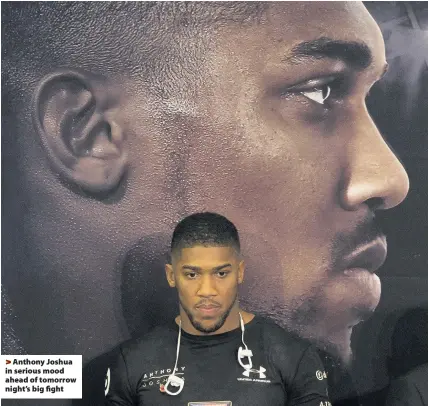  ??  ?? > Anthony Joshua in serious mood ahead of tomorrow night’s big fight