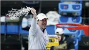  ?? DARRON CUMMINGS — THE ASSOCIATED PRESS ?? Baylor coach Scott Drew cuts down the net after the championsh­ip game against Gonzaga in the NCAA college basketball tournament at Lucas Oil Stadium in Indianapol­is.