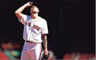  ?? Maddie Meyer / Getty Images ?? The Red Sox’s Tanner Houck reacts during the first inning against the Orioles on Saturday.