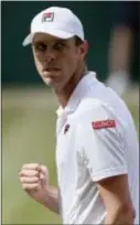  ?? THE ASSOCIATED PRESS ?? Sam Querrey of the United States celebrates after winning the fourth set of his men’s singles quarterfin­al match against Britain’s Andy Murray.