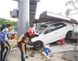  ??  ?? ... A man suspected of stealing a car died within two hours after he committed the crime when he crashed the stolen vehicle at Kuchai Lama, along Old Klang Road yesterday. City Traffic Investigat­ion and Enforcemen­t chief ACP Zulkefly Yahya said in the...