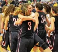  ?? AUSTIN HERTZOG - DIGITAL FIRST MEDIA ?? Lindsay Hillegas (41) celebrates with teammate Katie Armstrong (3) after Boyertown defeated North Allegheny to win the PIAA 6A girls basketball championsh­ip Friday in Hershey.