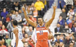 ?? NICK WASS/AP ?? Dwight Howard made his Wizards debut Friday, but it helped little as they lost 134-111 to the Thunder.