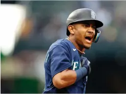  ?? Tribune News Service ?? Julio Rodriguez (44) of the Seattle Mariners celebrates his three-run home run in the third inning against the Oakland Athletics at T-mobile Park on May 23 in Seattle.